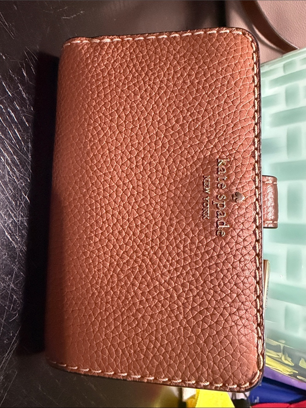 kate spade Pebbled Leather Bifold Wallet in Brown with Gold Logo